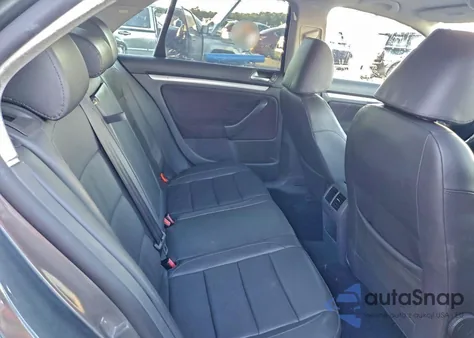 2009 Volkswagen Jetta Wolfsburg из США, поврежденный, VIN 3VWRJ71K19M044481